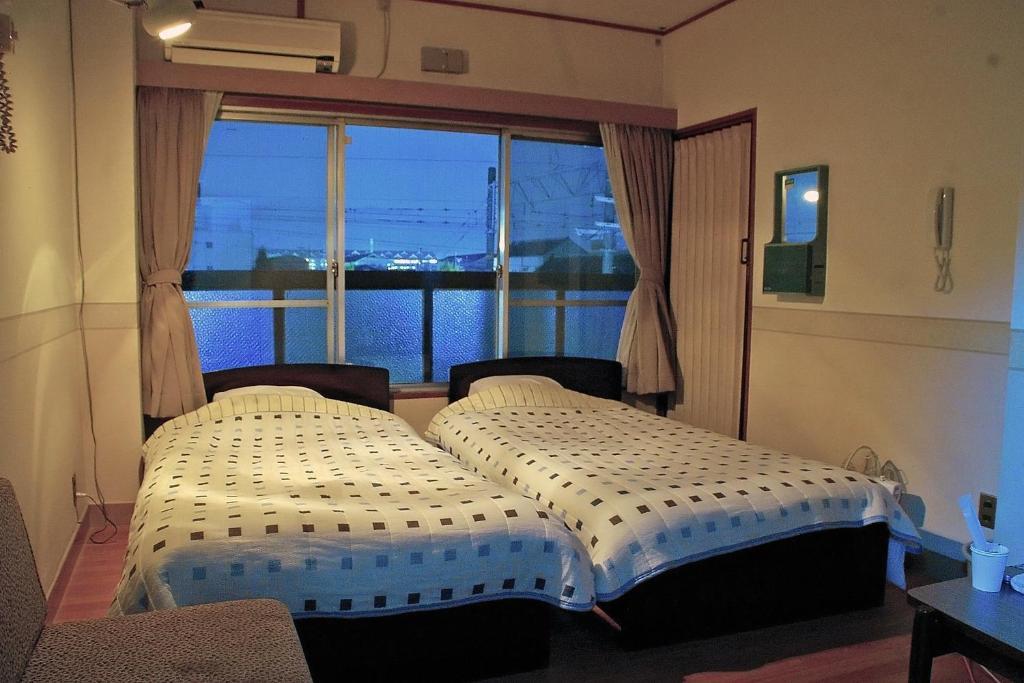 Yamabe Hotel Tenri Værelse billede